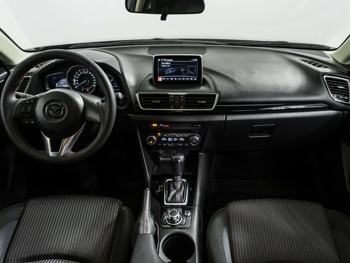 Mazda 3 с пробегом — 2015 год. Фото: #9