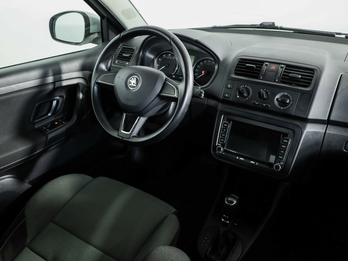 Skoda Fabia с пробегом — 2014 год. Фото: #6