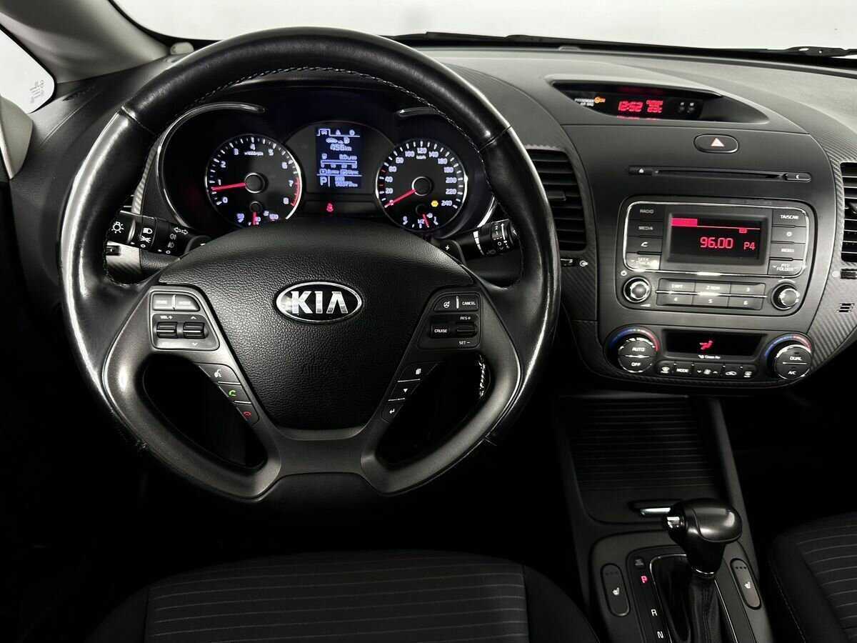 Kia Cerato с пробегом — 2014 год. Фото: #6