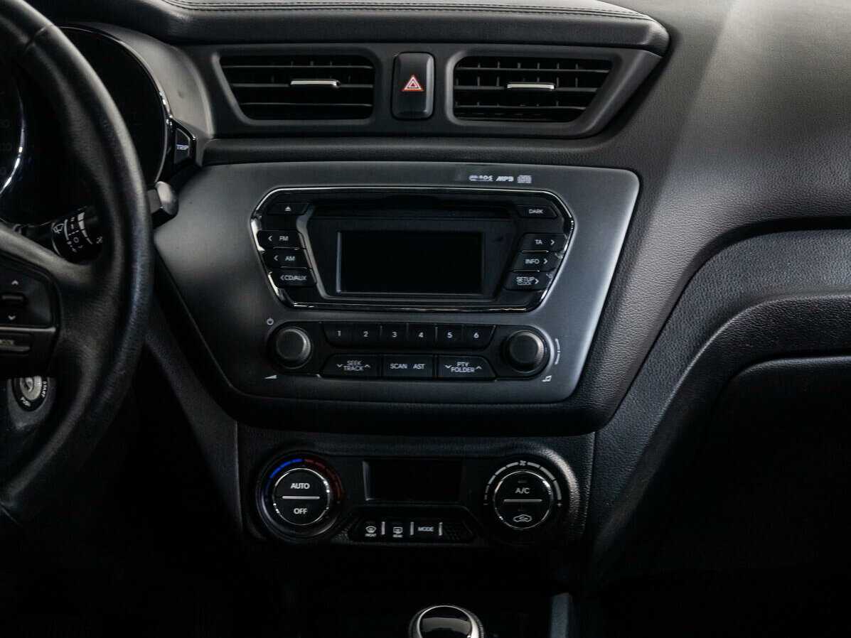 Kia Rio с пробегом — 2013 год. Фото: #11