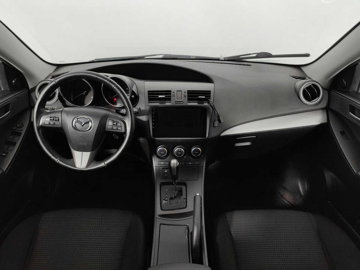 Mazda 3 с пробегом — 2012 год. Фото: #11