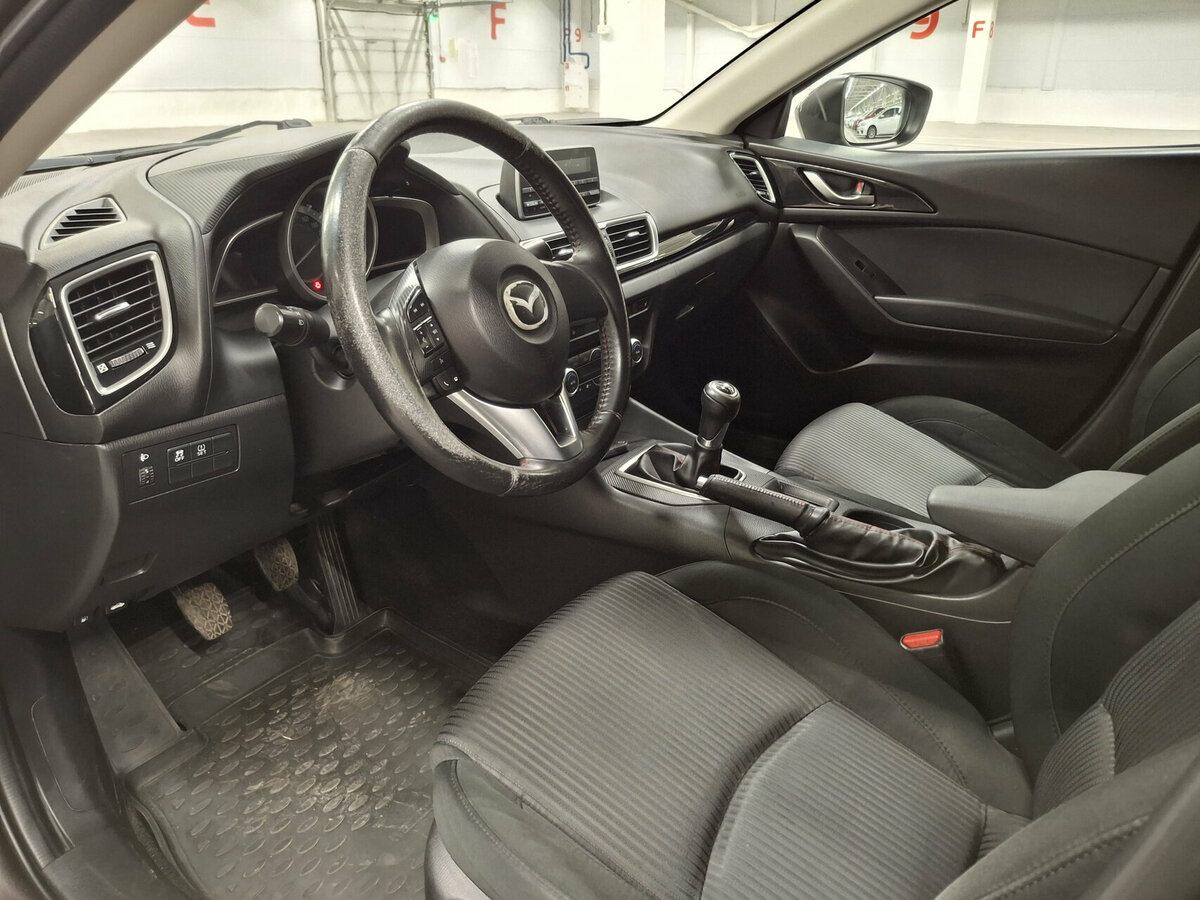 Mazda 3 с пробегом — 2014 год. Фото: #14