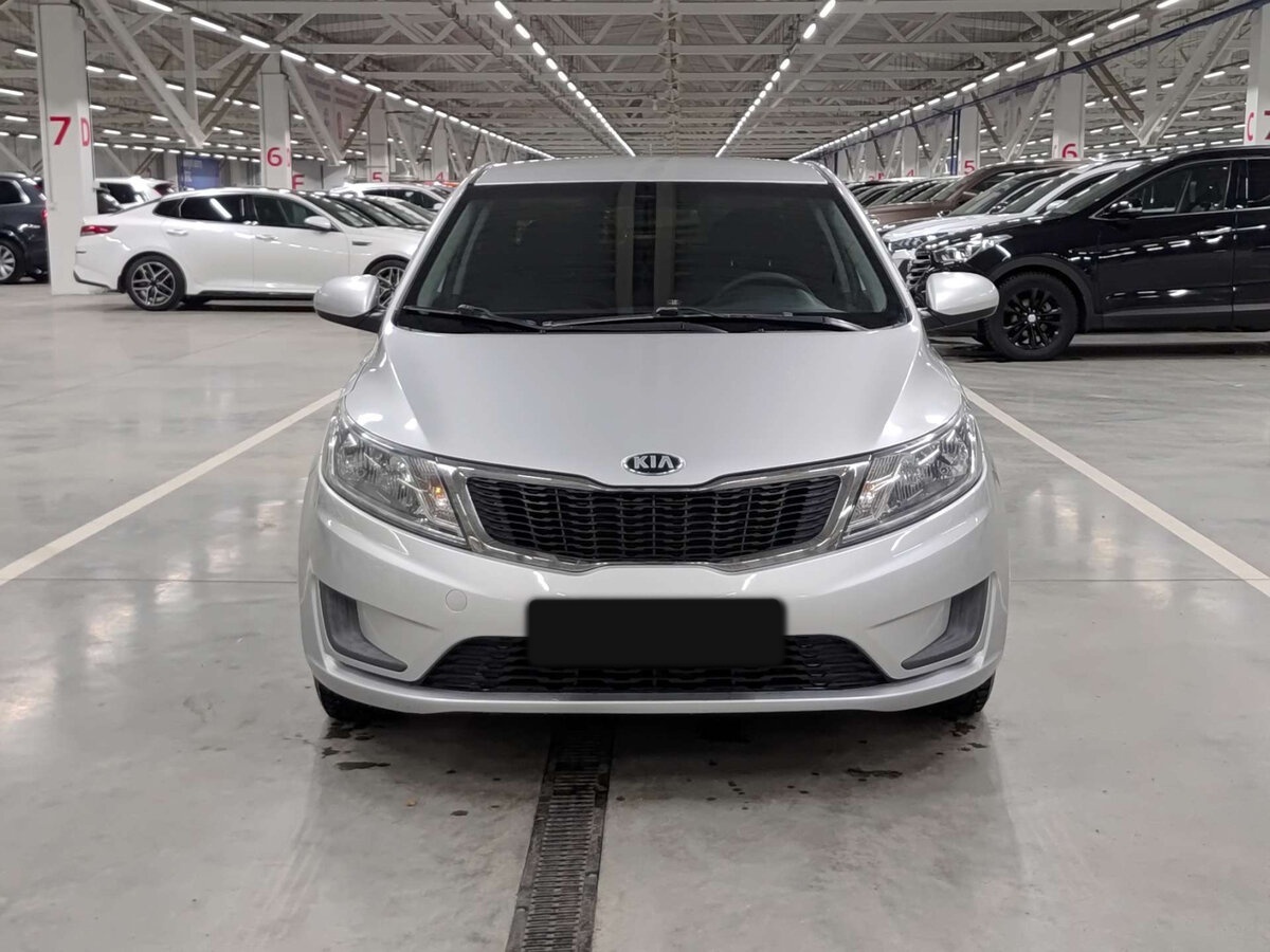 Kia Rio с пробегом — 2014 год. Фото: #1