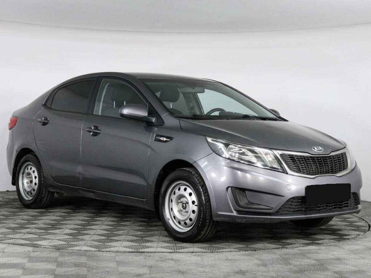 Kia Rio с пробегом — 2014 год. Фото: #1