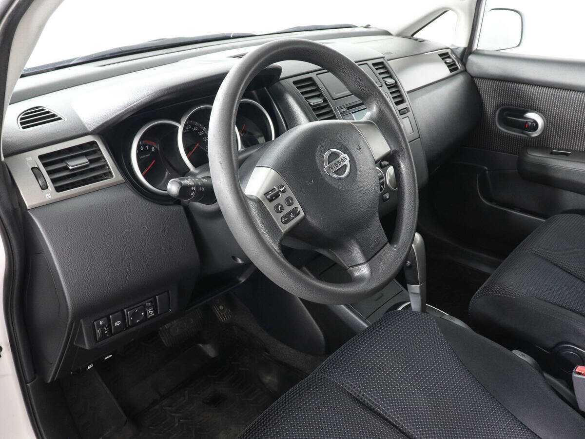 Nissan Tiida с пробегом — 2013 год. Фото: #8