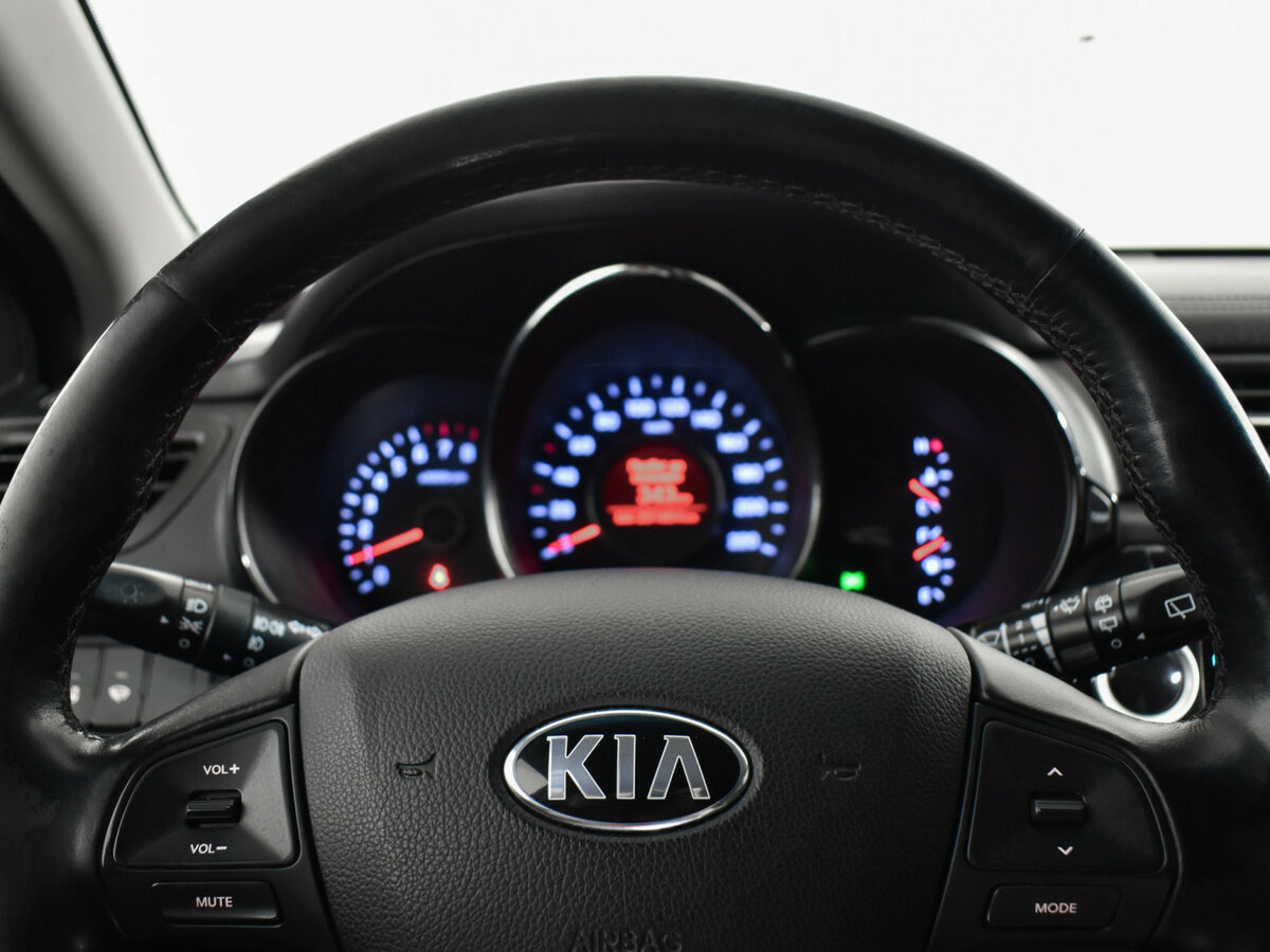 Kia Rio с пробегом — 2014 год. Фото: #13