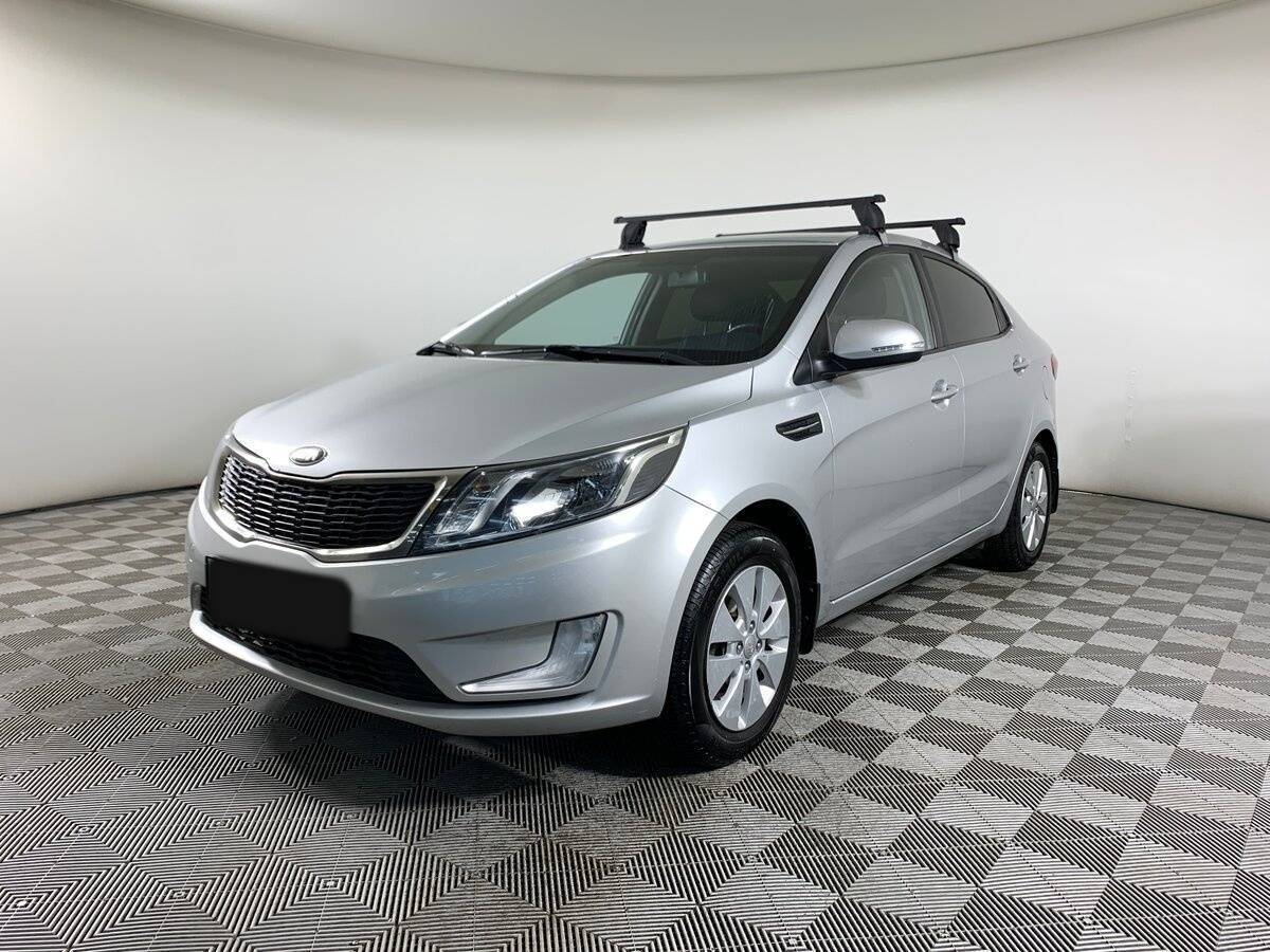 Kia Rio с пробегом — 2013 год. Фото: #0