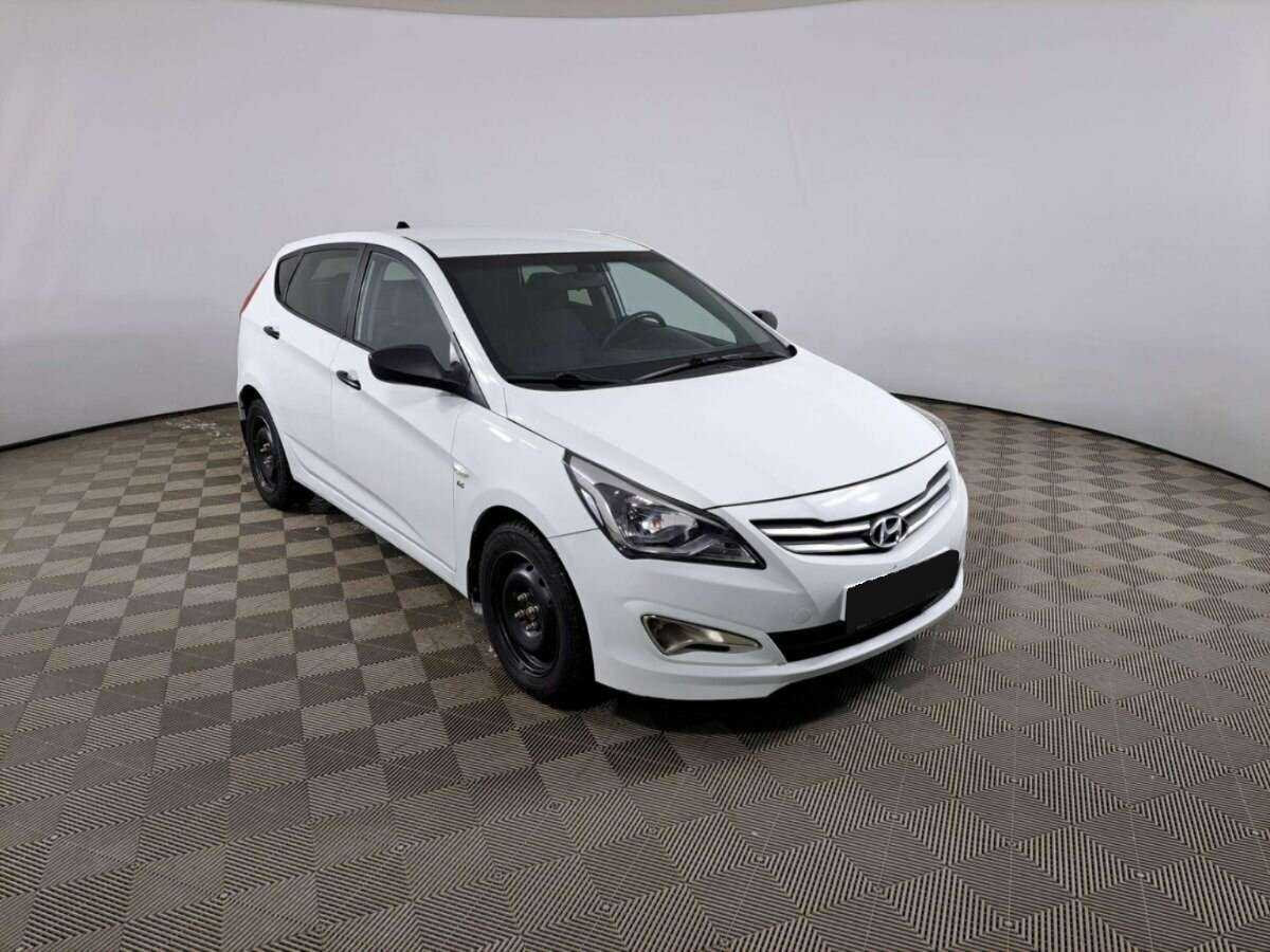 Hyundai Solaris с пробегом — 2014 год. Фото: #2