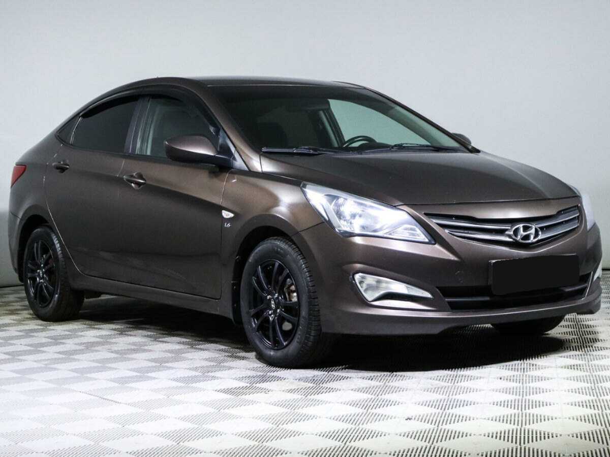 Hyundai Solaris с пробегом — 2014 год. Фото: #2