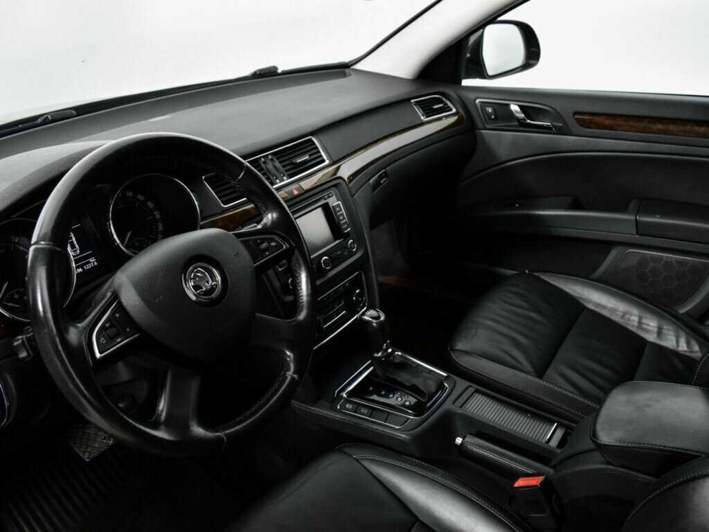 Skoda Superb с пробегом — 2013 год. Фото: #6