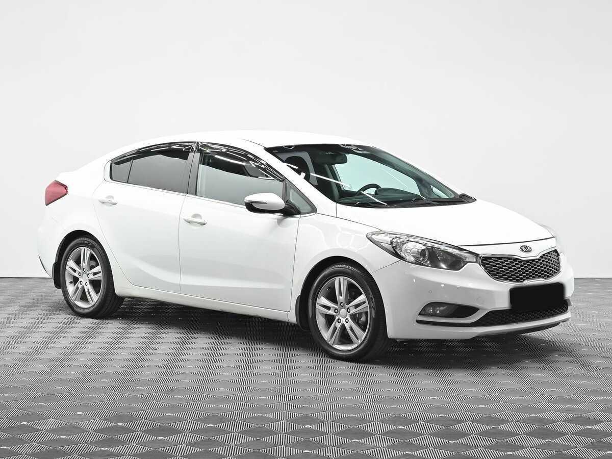 Kia Cerato с пробегом — 2013 год. Фото: #1
