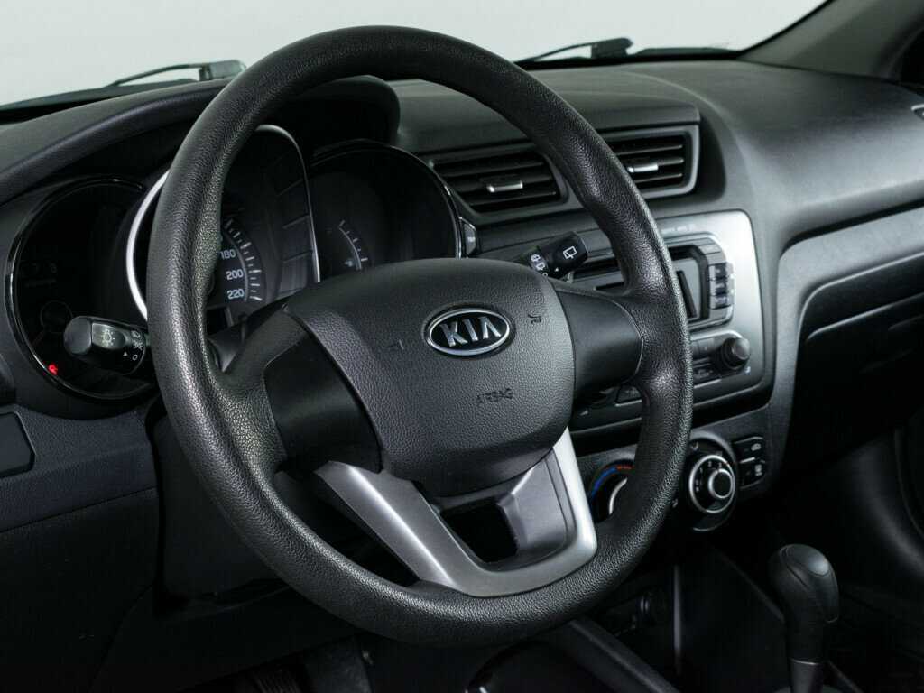 Kia Rio с пробегом — 2012 год. Фото: #11