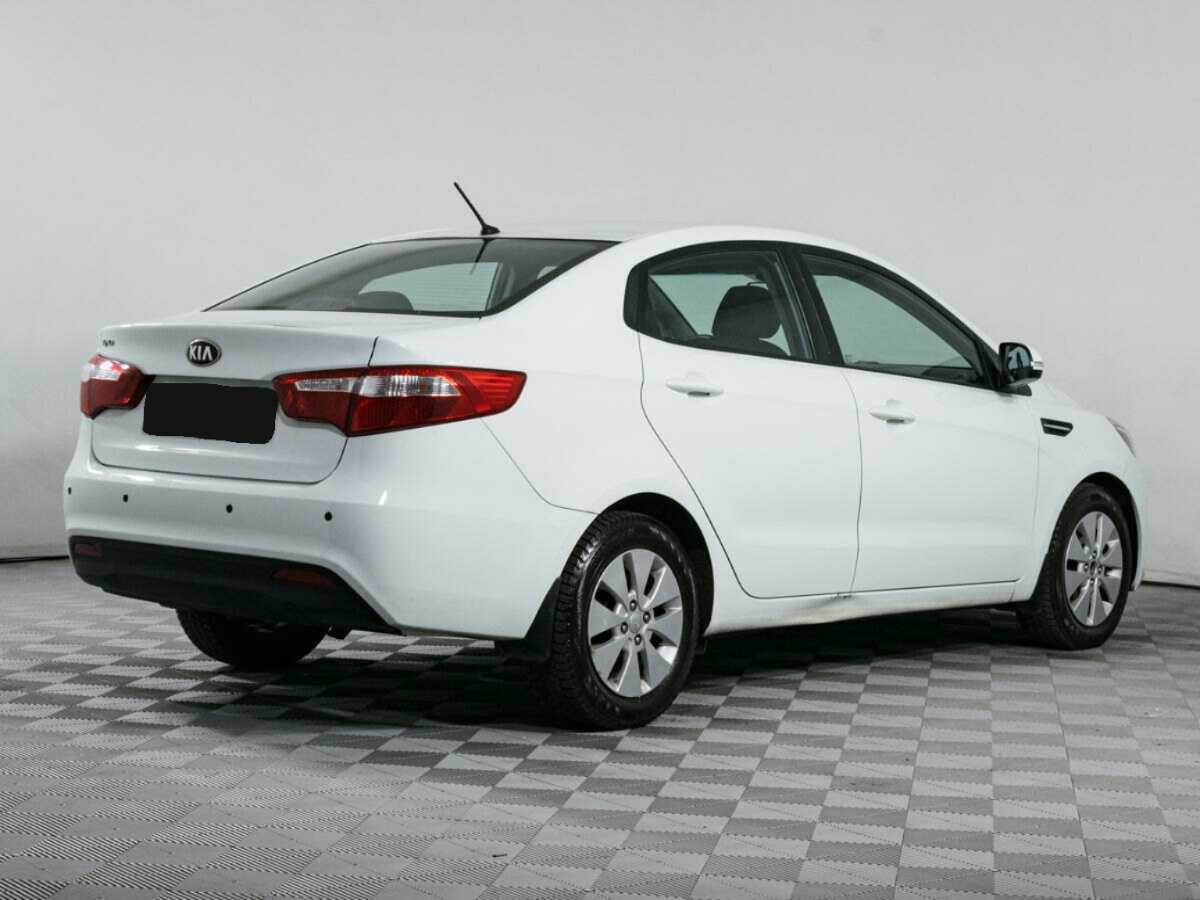 Kia Rio с пробегом — 2013 год. Фото: #3