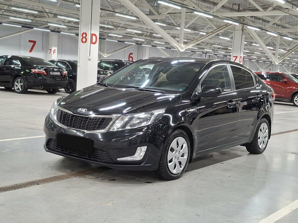 Kia Rio с пробегом — 2014 год. Фото: #0