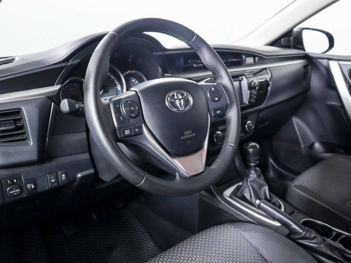 Toyota Corolla с пробегом — 2014 год. Фото: #10