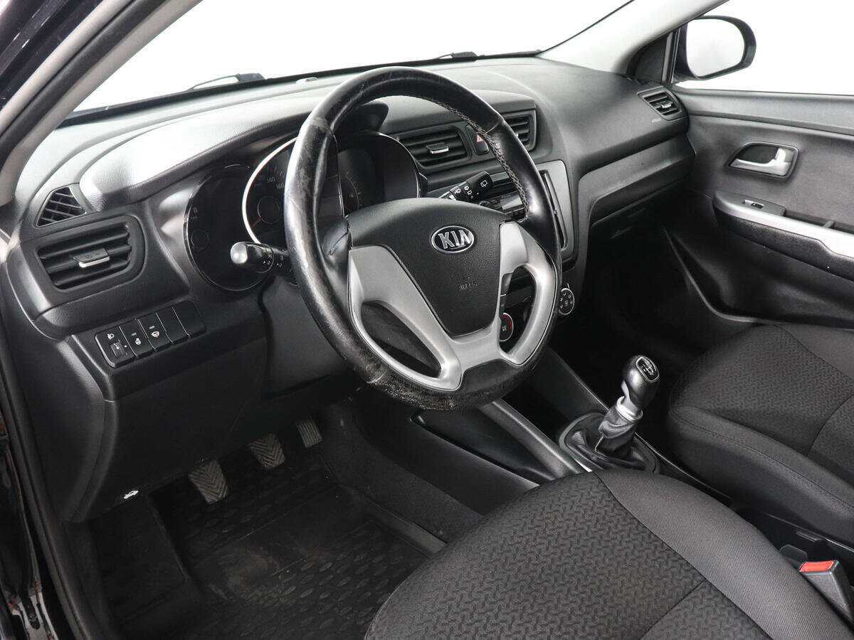 Kia Rio с пробегом — 2015 год. Фото: #4