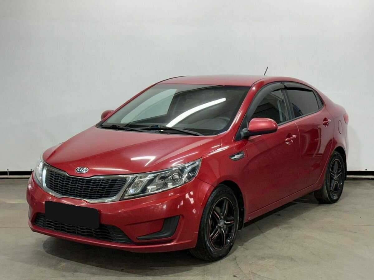 Kia Rio с пробегом — 2013 год. Фото: #0