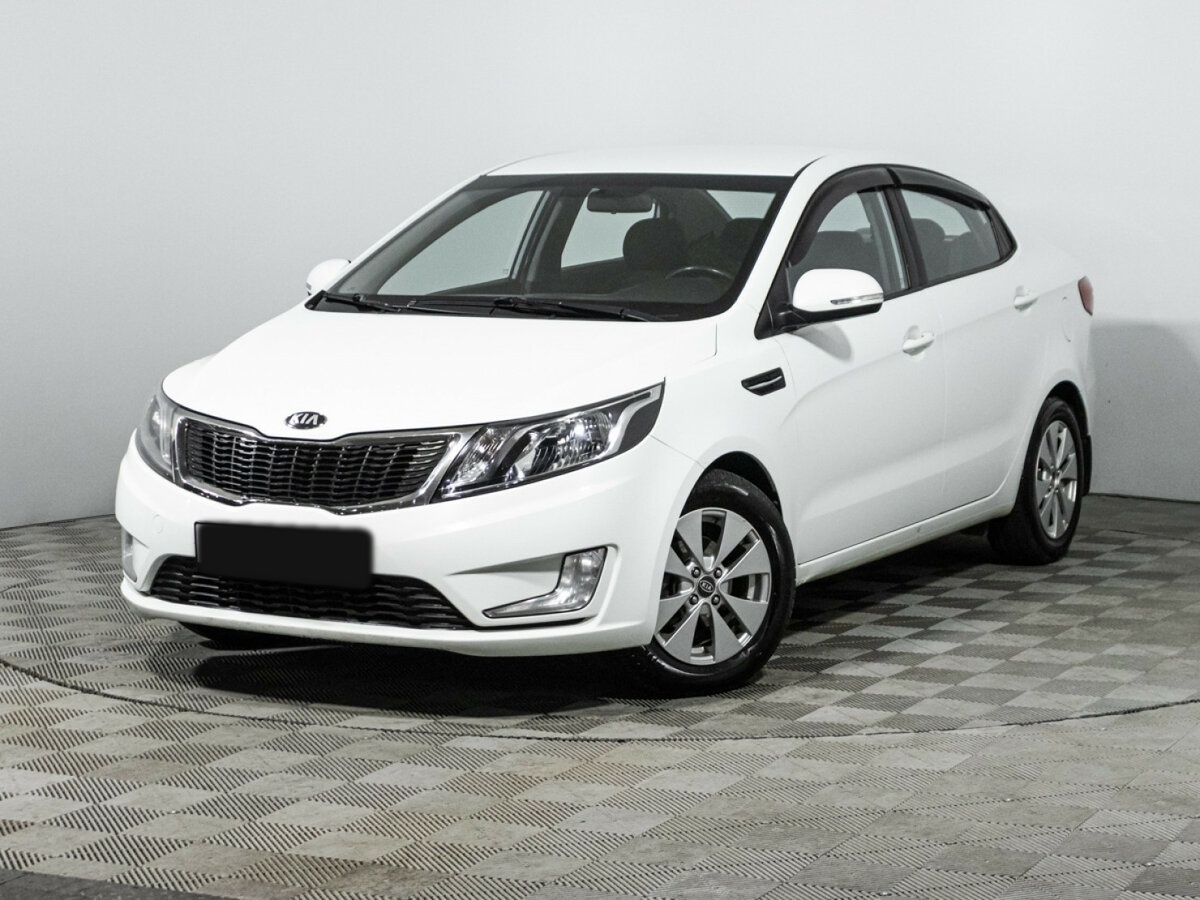 Kia Rio с пробегом — 2013 год. Посмотреть фото