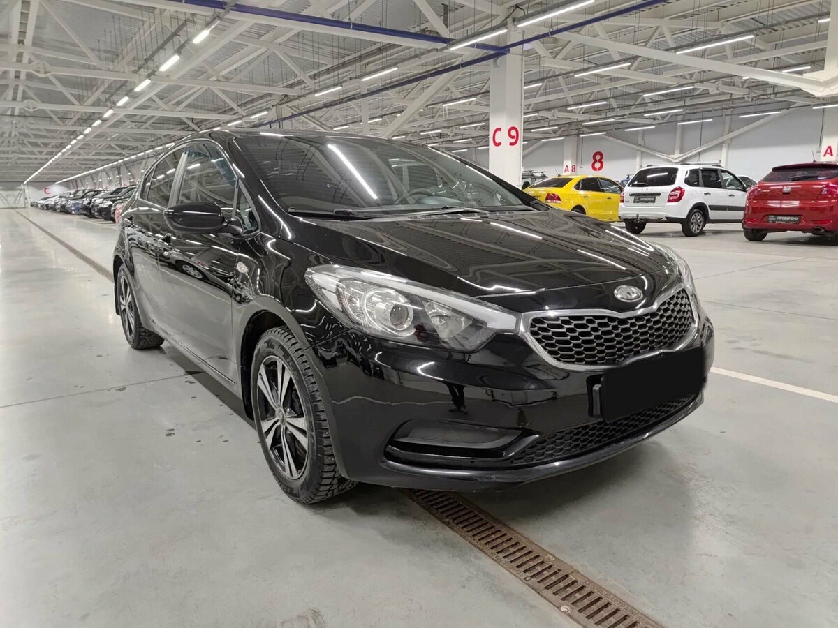 Kia Cerato с пробегом — 2013 год. Фото: #2