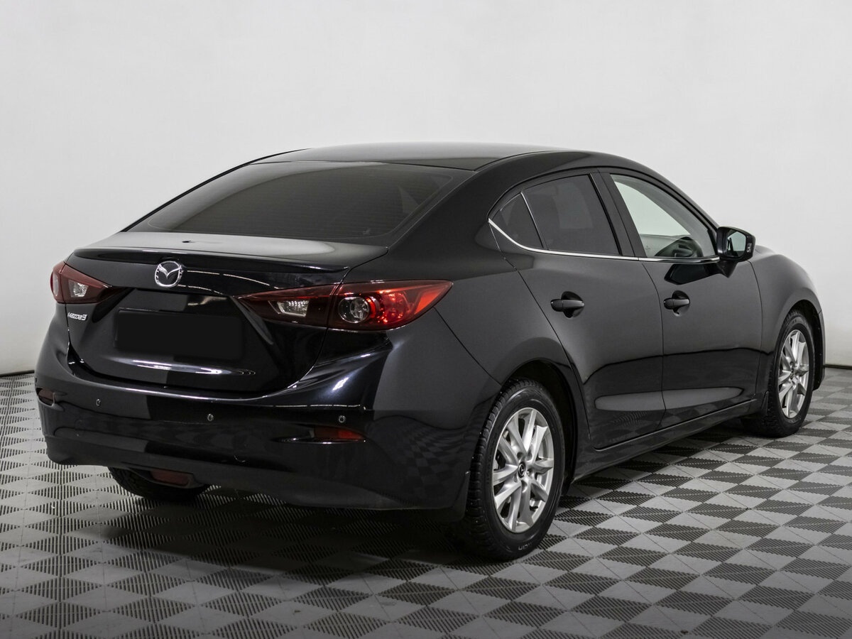 Mazda 3 с пробегом — 2015 год. Фото: #3