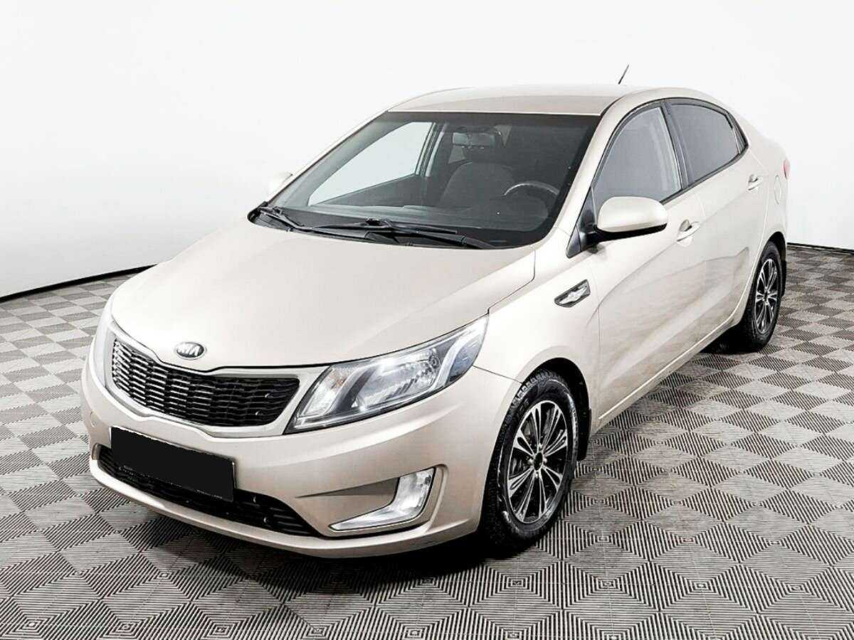 Kia Rio с пробегом — 2013 год. Фото: #0
