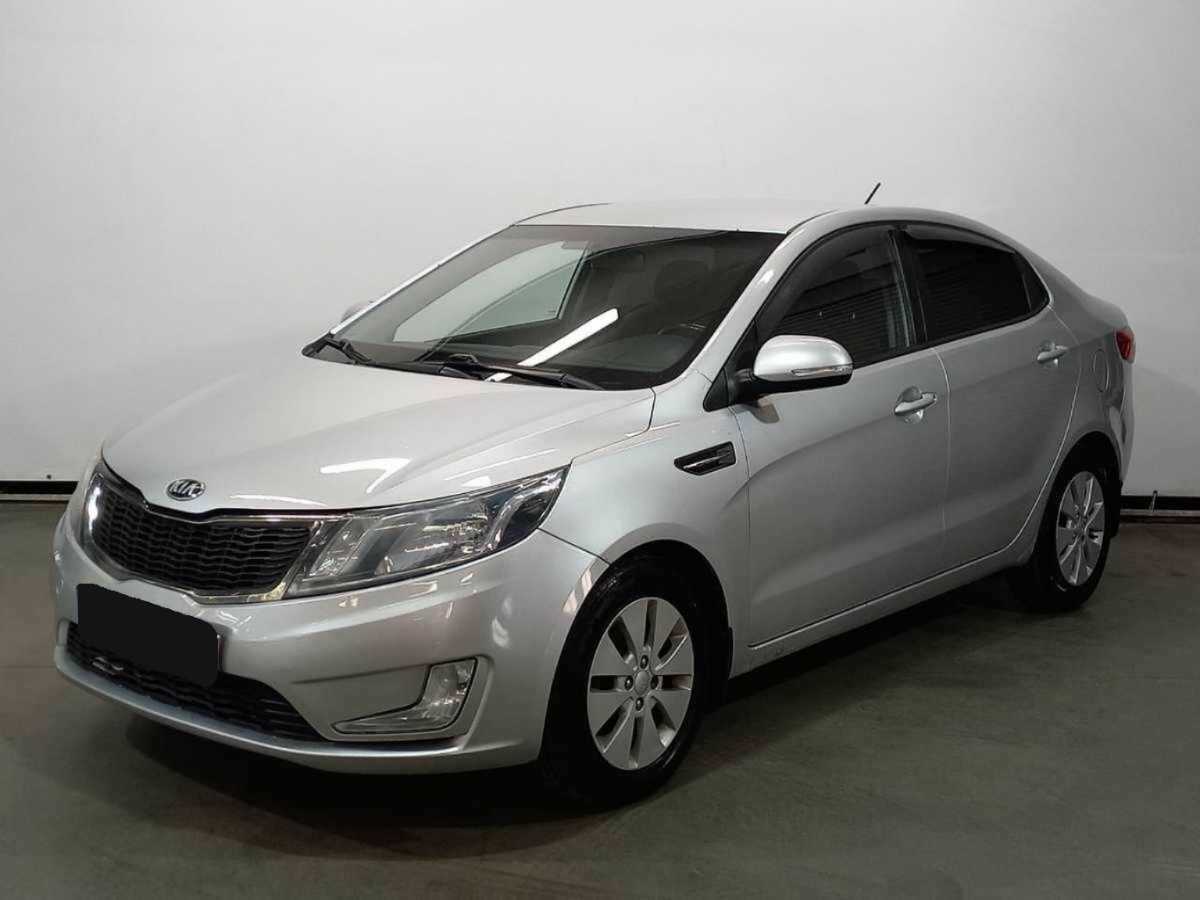Kia Rio с пробегом — 2013 год. Фото: #0