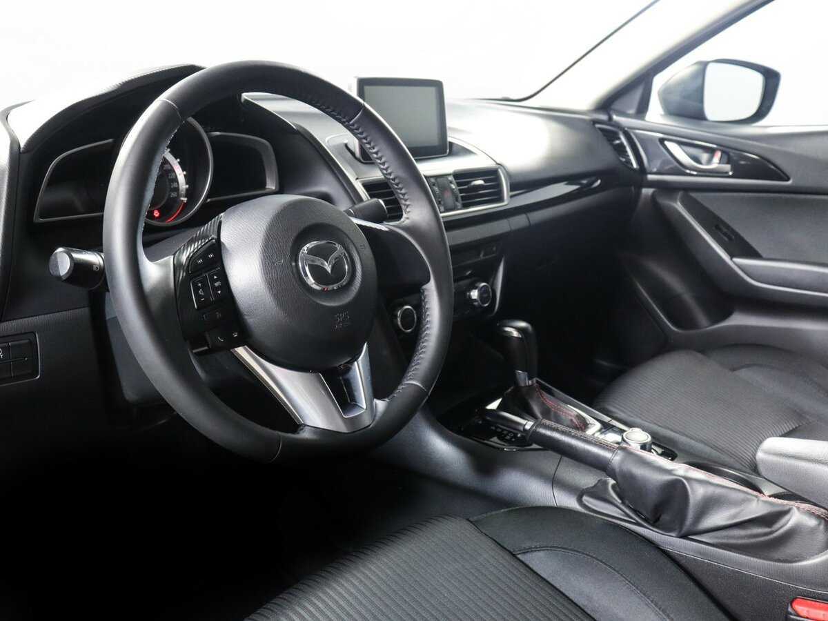 Mazda 3 с пробегом — 2014 год. Фото: #12