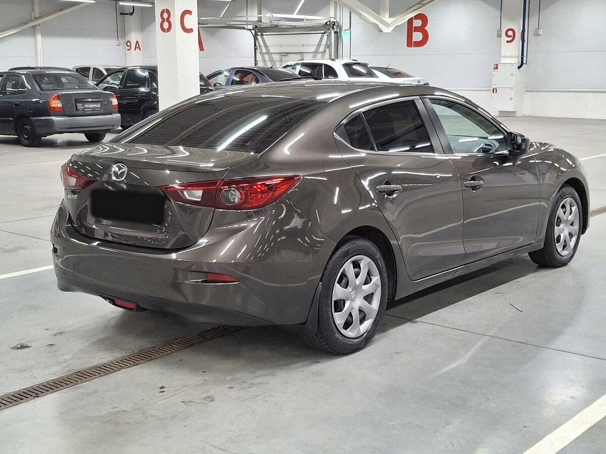 Mazda 3 с пробегом — 2014 год. Фото: #4