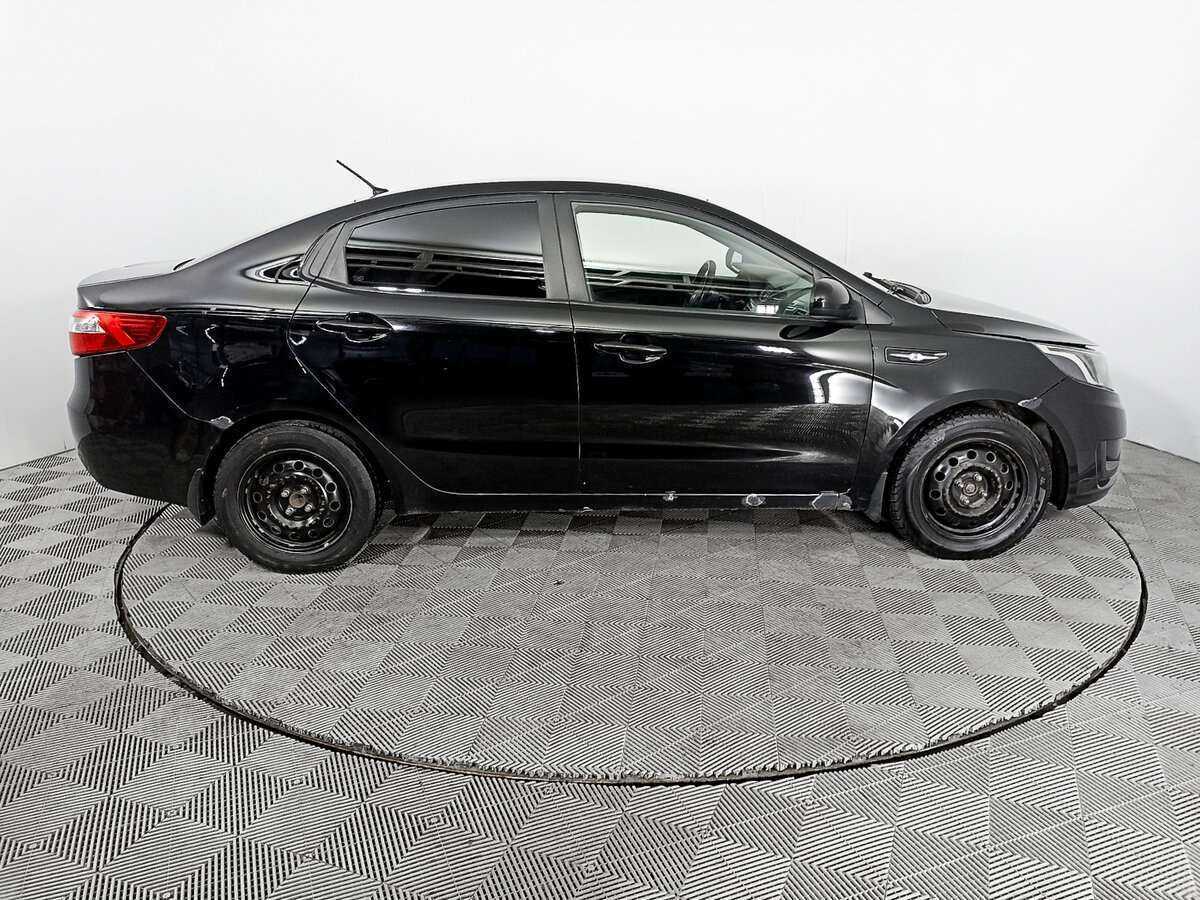 Kia Rio с пробегом — 2012 год. Фото: #3