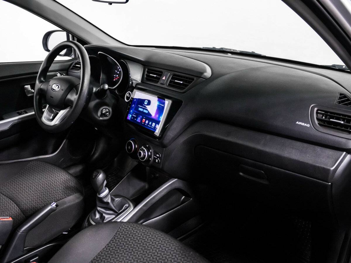 Kia Rio с пробегом — 2014 год. Фото: #7