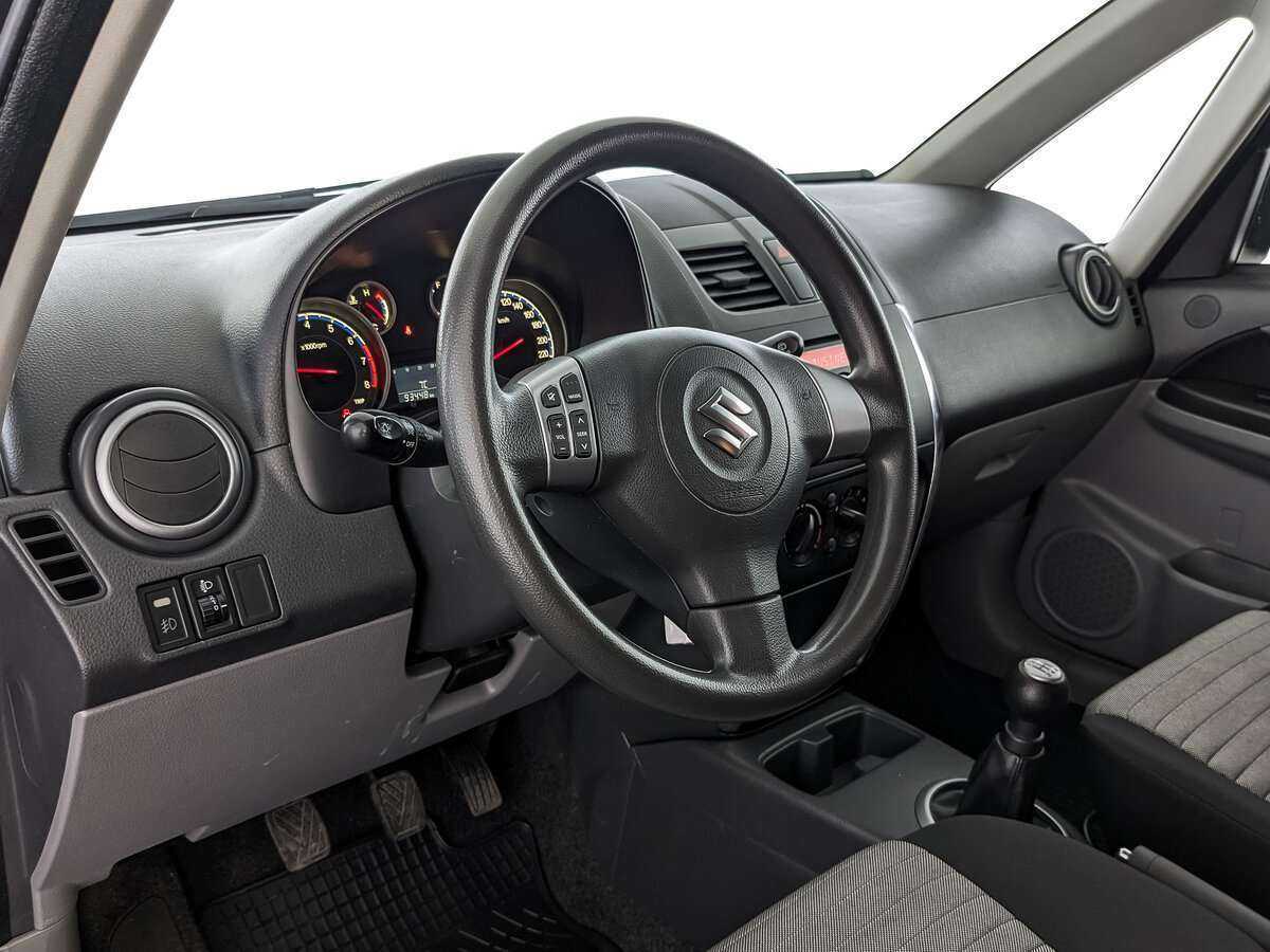 Suzuki SX4 с пробегом — 2014 год. Фото: #10