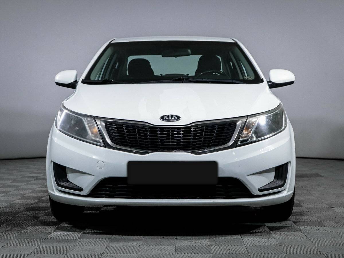 Kia Rio с пробегом — 2014 год. Фото: #1