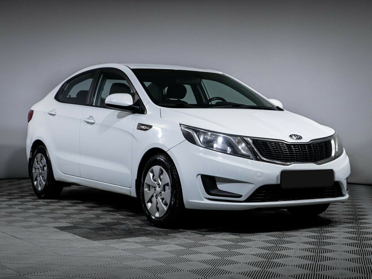 Kia Rio с пробегом — 2014 год. Фото: #2