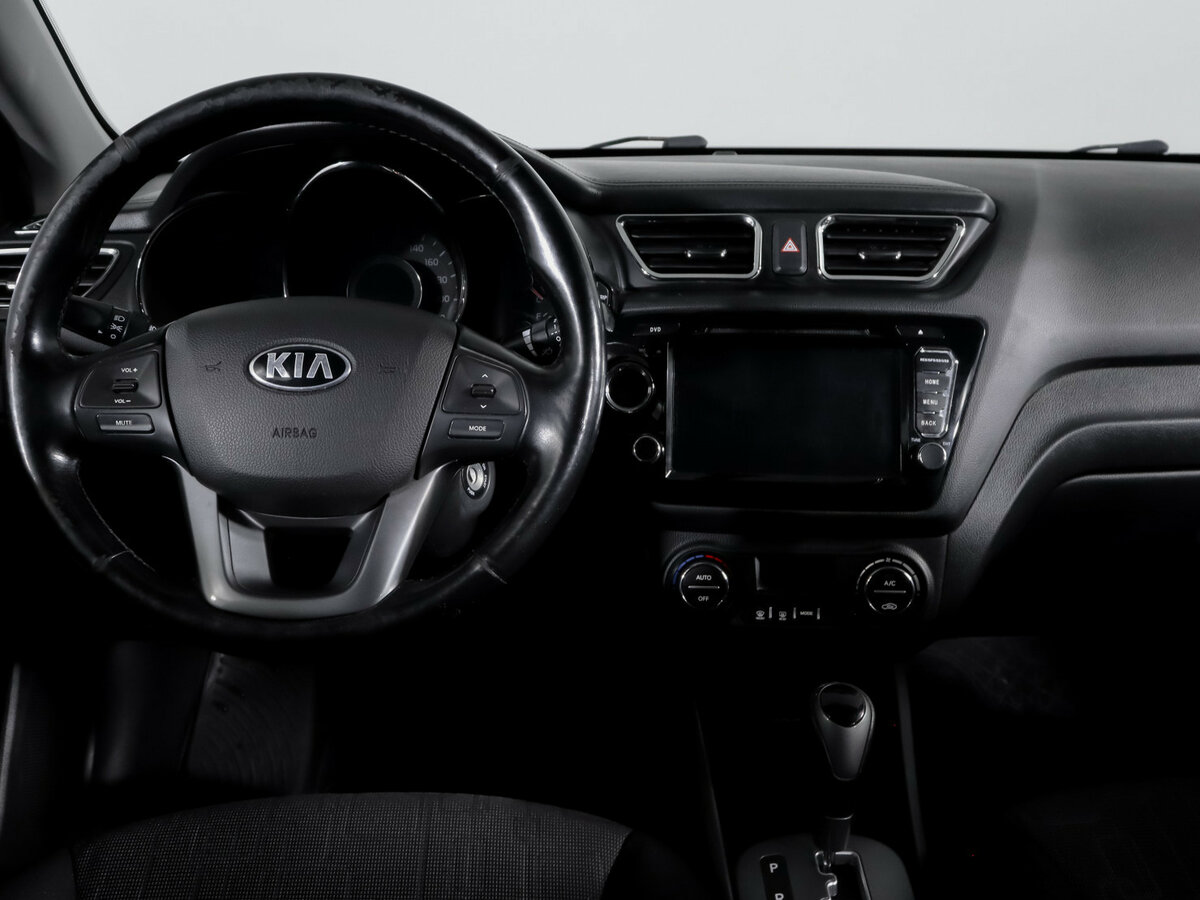 Kia Rio с пробегом — 2013 год. Фото: #9