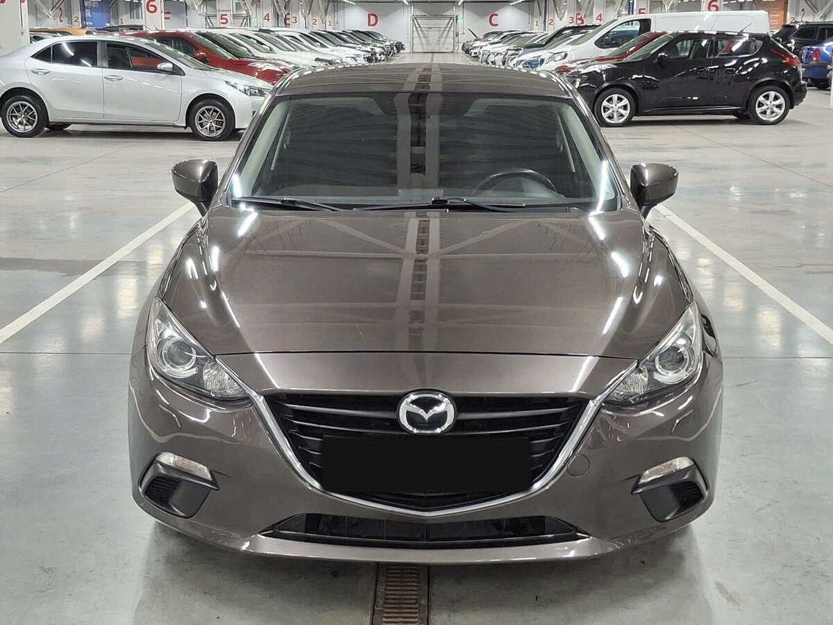 Mazda 3 с пробегом — 2014 год. Фото: #1