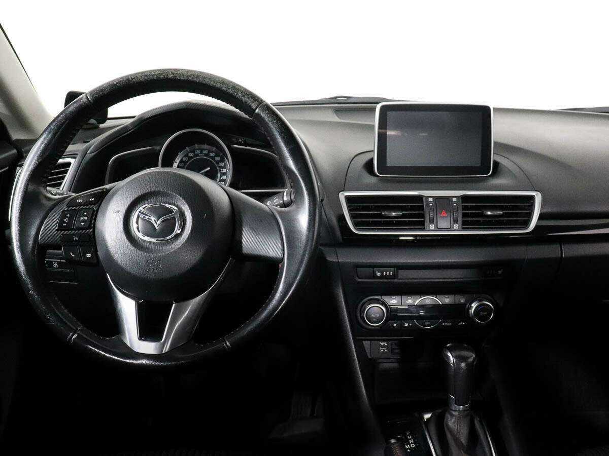 Mazda 3 с пробегом — 2014 год. Фото: #9