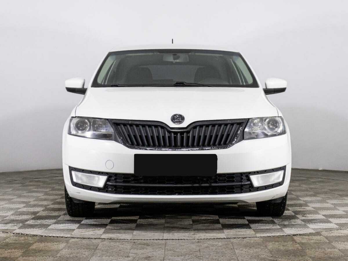 Skoda Rapid с пробегом — 2014 год. Посмотреть фото