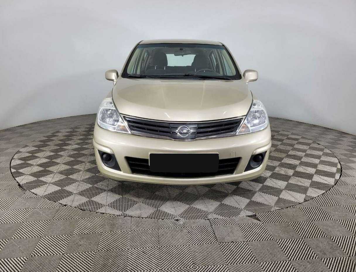 Nissan Tiida с пробегом — 2013 год. Фото: #1