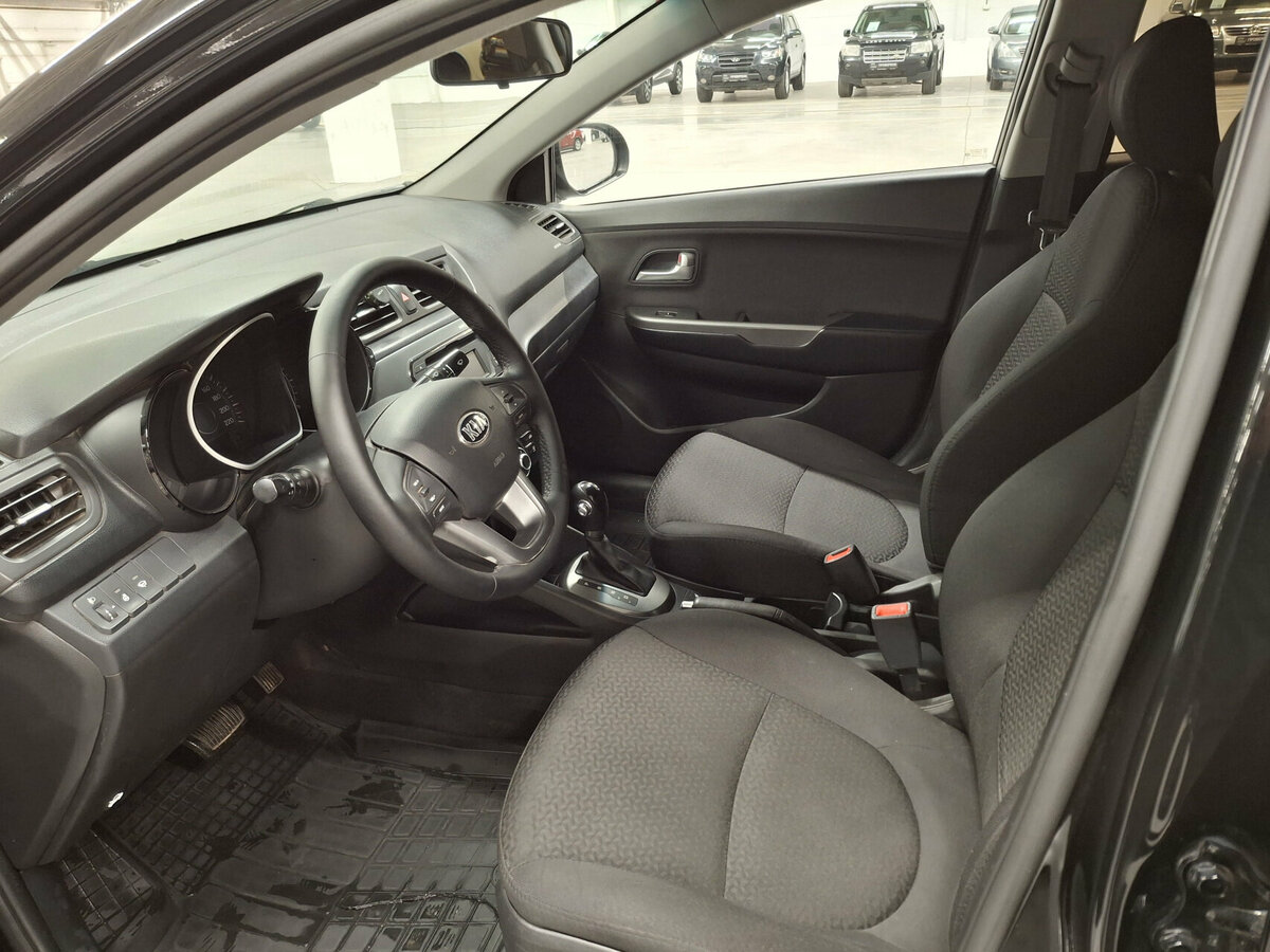 Kia Rio с пробегом — 2014 год. Фото: #13