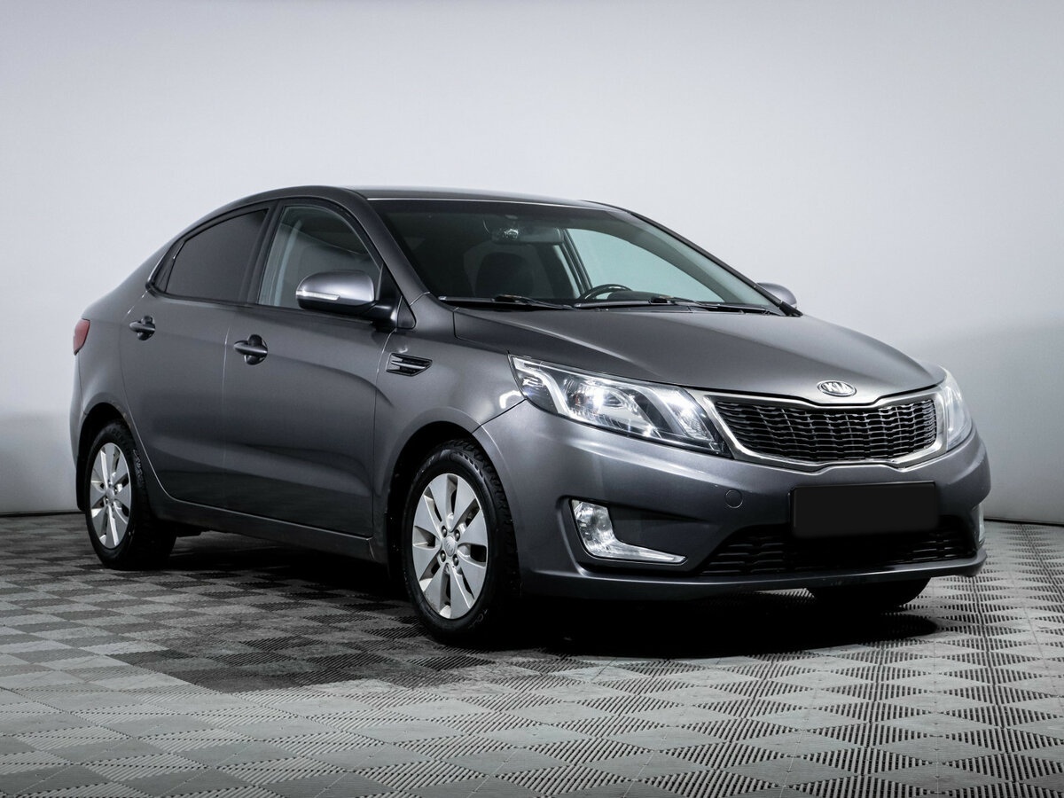 Kia Rio с пробегом — 2013 год. Фото: #2