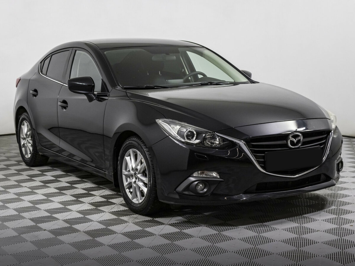 Mazda 3 с пробегом — 2015 год. Фото: #2