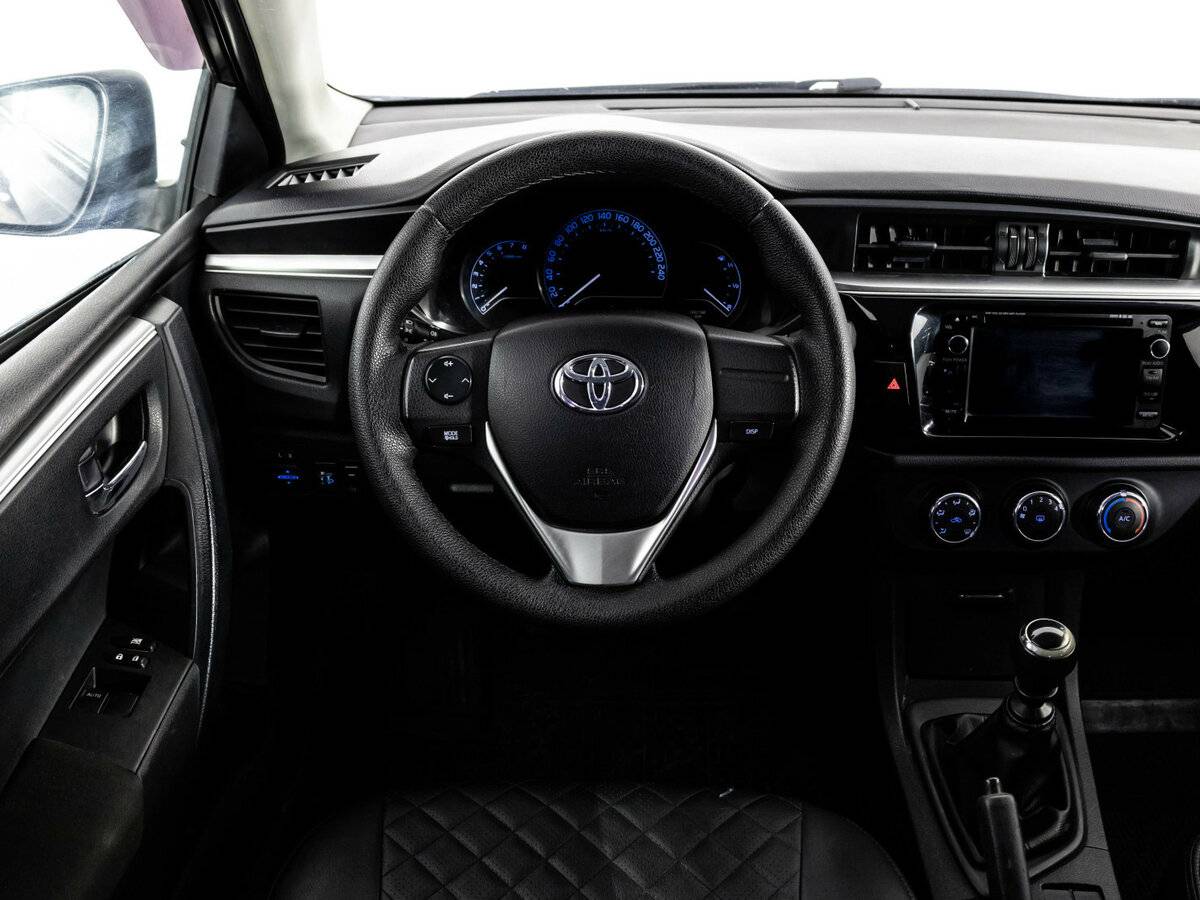 Toyota Corolla с пробегом — 2014 год. Фото: #8