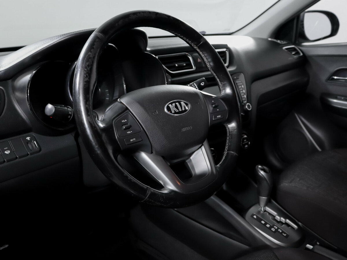 Kia Rio с пробегом — 2013 год. Фото: #10