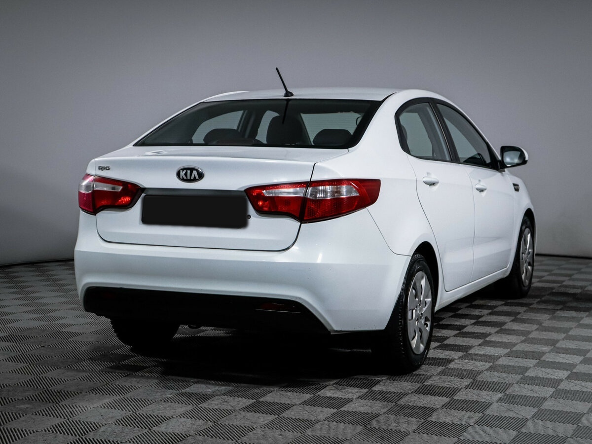 Kia Rio с пробегом — 2014 год. Фото: #3