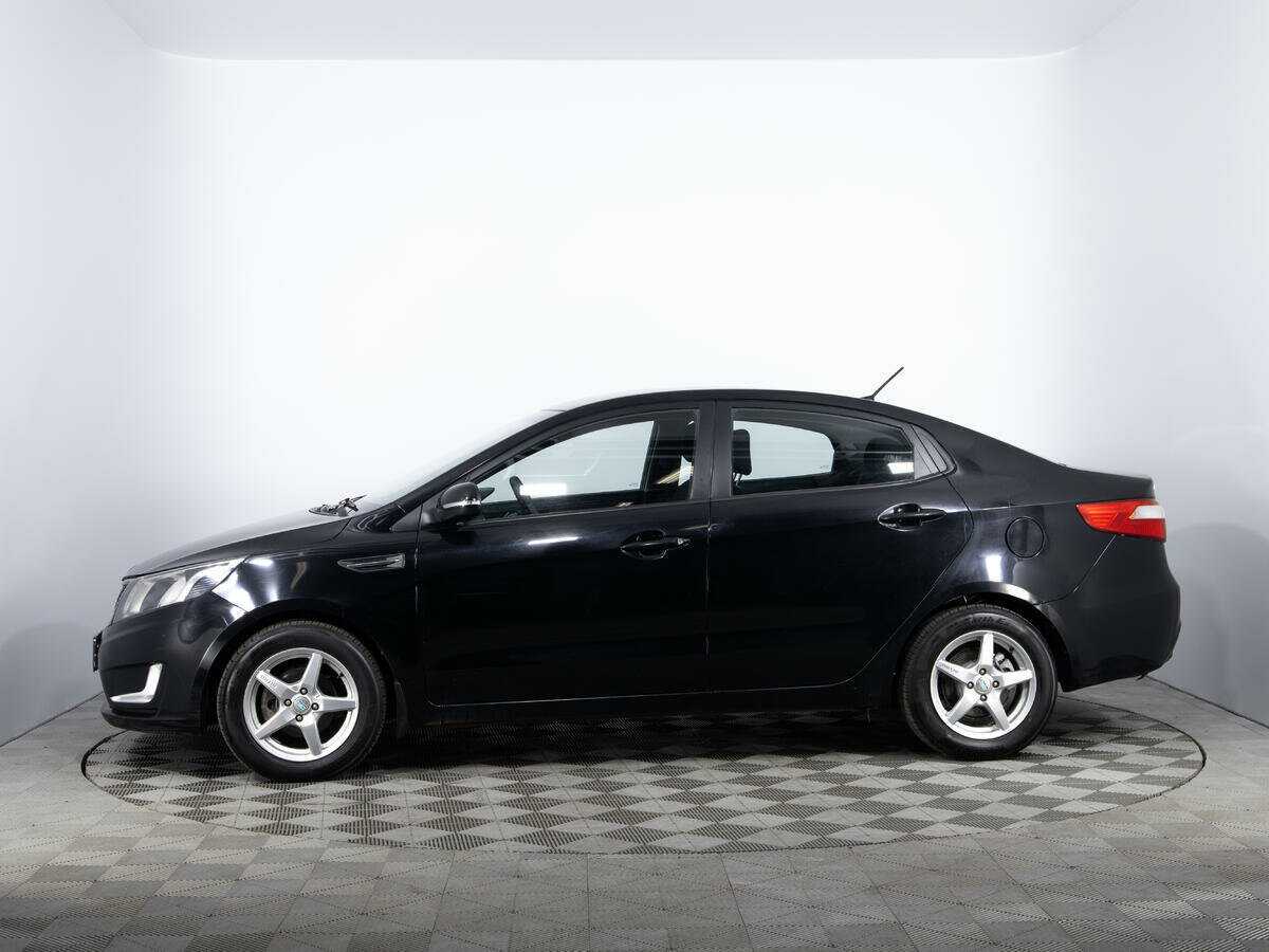 Kia Rio с пробегом — 2014 год. Фото: #7