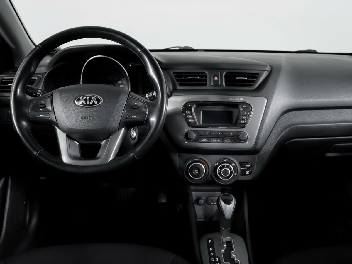 Kia Rio с пробегом — 2014 год. Фото: #9