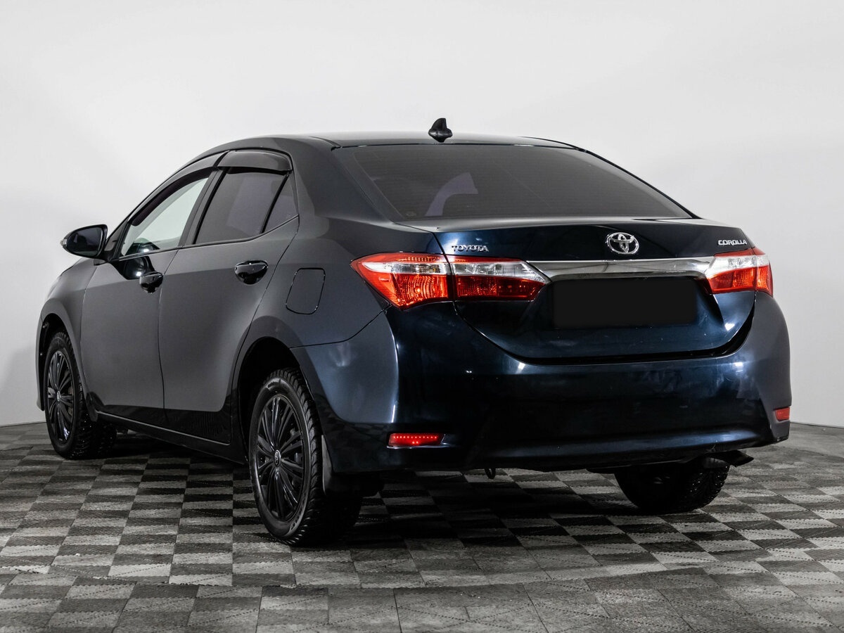 Toyota Corolla с пробегом — 2014 год. Фото: #5