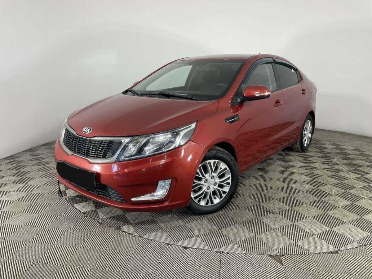 Kia Rio с пробегом — 2013 год. Фото: #0