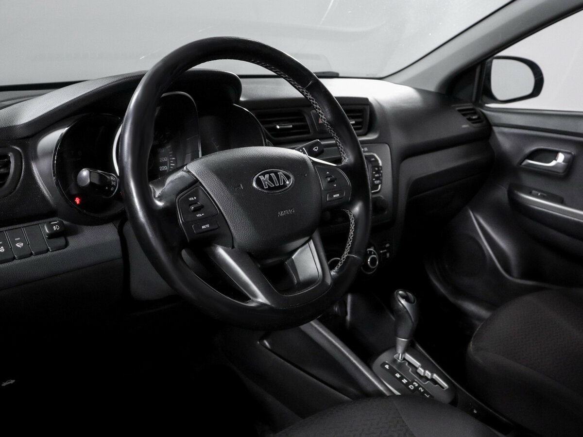 Kia Rio с пробегом — 2015 год. Фото: #9
