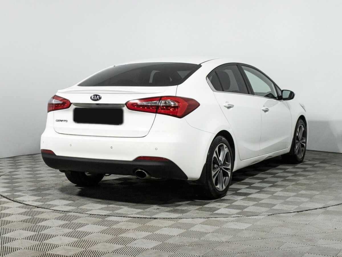 Kia Cerato с пробегом — 2015 год. Фото: #4